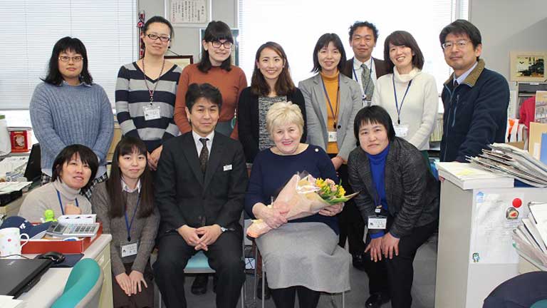 Angela with current staff members of the International Division Angela with current staff members of the International Division