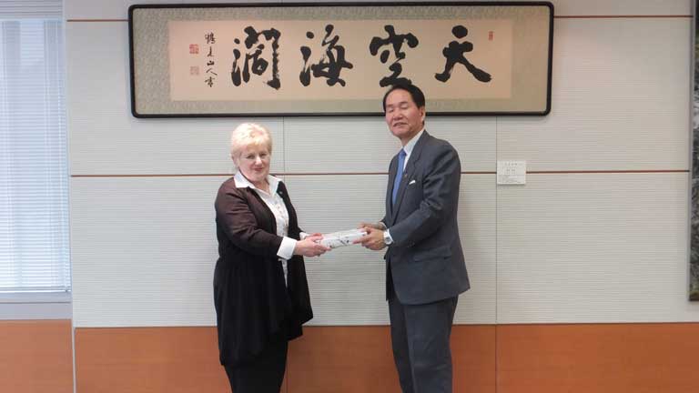 Angela receiving a gift from the Governor of Kagawa Angela receiving a gift from the Governor of Kagawa